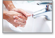 washing hands to clean bacteria